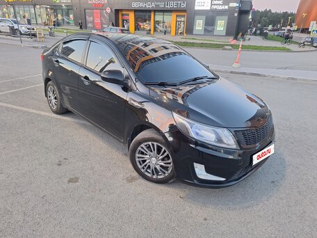 2012 Kia Rio 5-speed III, чёрный, 780000 рублей, вид 1