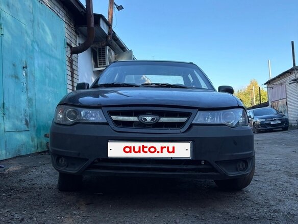 2011 Daewoo Nexia I Рестайлинг, чёрный, 149999 рублей