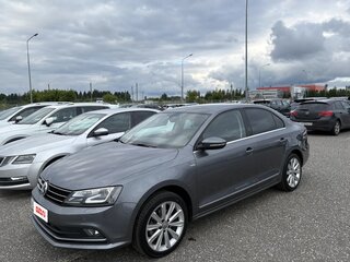 2016 Volkswagen Jetta VI Рестайлинг, серый, 1750000 рублей, вид 2