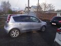 2010 Nissan Note I Рестайлинг, серебристый, 630000 рублей - вид 2