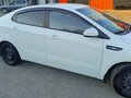 2015 Kia Rio III Рестайлинг, белый, 920000 рублей - вид 2