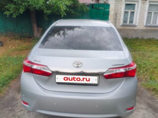 2014 Toyota Corolla XI (E160, E170, E180), серый, 950000 рублей, вид 4