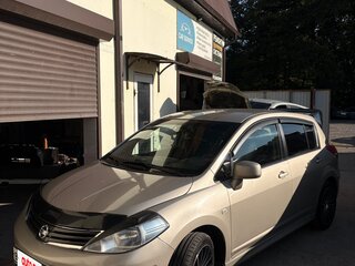 2012 Nissan Tiida I, серебристый, 799000 рублей, вид 2
