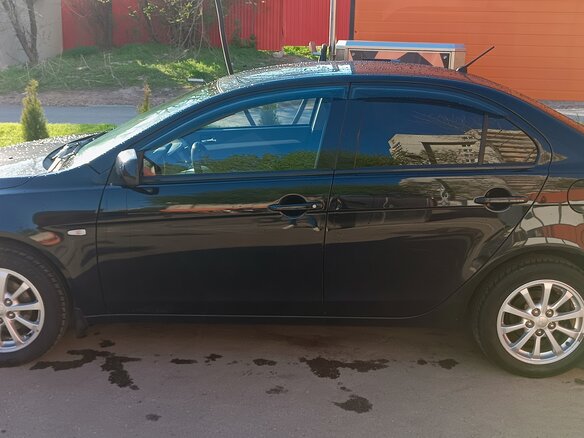 2010 Mitsubishi Lancer X, чёрный, 770000 рублей - вид 5