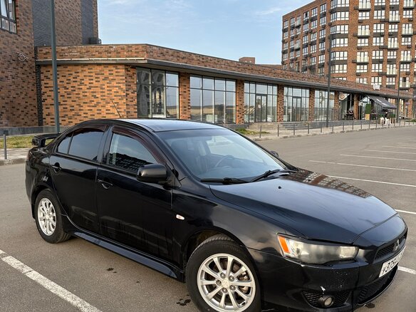 2010 Mitsubishi Lancer X, чёрный, 720000 рублей - вид 5