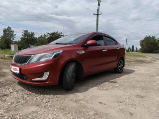 2011 Kia Rio 5-speed III, красный, 750000 рублей, вид 1