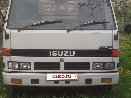1990 Isuzu Elf (N-series), белый, 1450000 рублей, вид 2