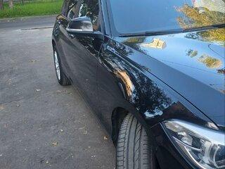 2016 BMW 1 серии 118i II (F20/F21) Рестайлинг, чёрный, 1850000 рублей, вид 1