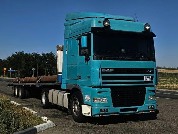 2004 DAF 95XF, синий, 2300000 рублей - вид 2
