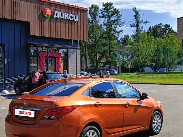 2014 Hyundai Solaris I Рестайлинг, оранжевый - вид 15