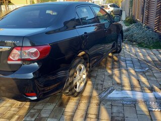 2011 Toyota Corolla X (E140, E150) Рестайлинг, чёрный, 908000 рублей, вид 4