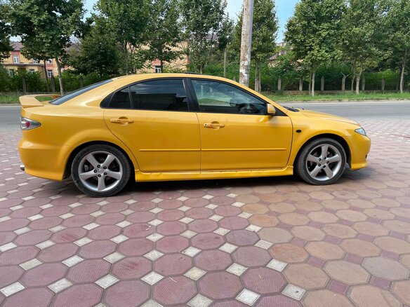 2003 Mazda 6 I (GG), жёлтый, 365000 рублей - вид 3