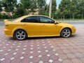 2003 Mazda 6 I (GG), жёлтый, 365000 рублей - вид 3