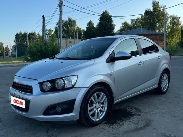2012 Chevrolet Aveo II, серебристый, 650000 рублей