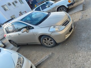 2009 Nissan Tiida I, золотистый, 520000 рублей, вид 3