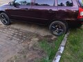 2011 Lada (ВАЗ) Kalina I, пурпурный, 280000 рублей - вид 3