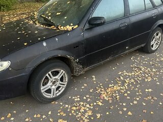 2002 Mazda 323 VI (BJ) Рестайлинг, чёрный, 140000 рублей, вид 2