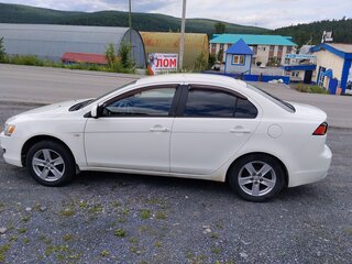 2010 Mitsubishi Lancer X, белый, 650000 рублей, вид 4
