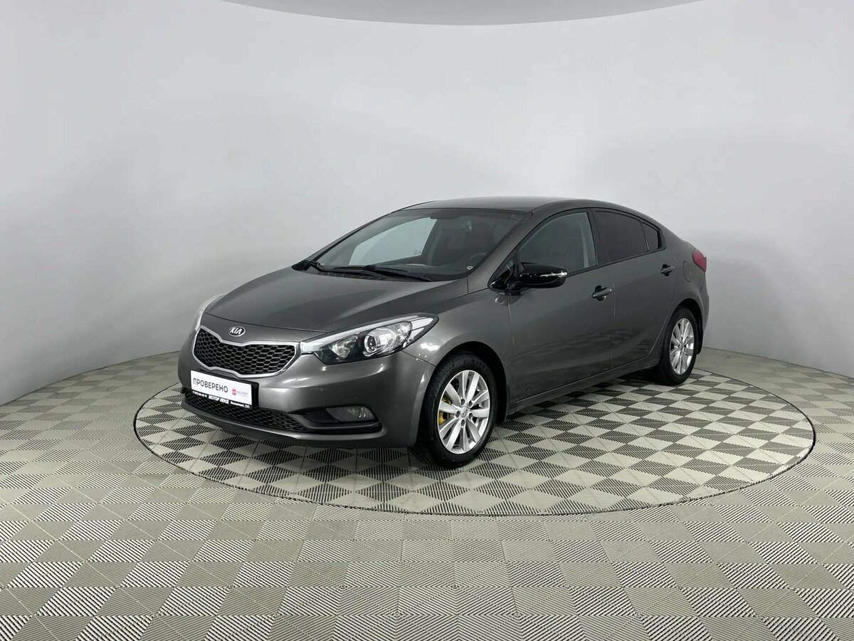 Открыть фотографии: Kia Cerato III