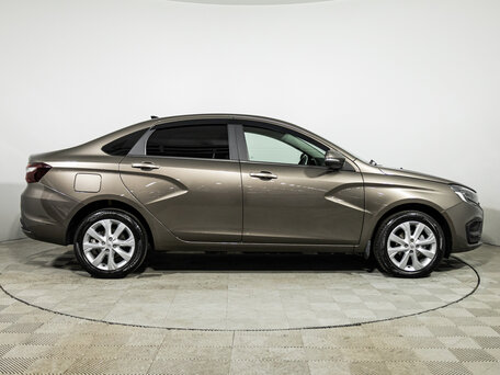 2024 Lada (ВАЗ) Vesta I Рестайлинг (NG), коричневый, 1149700 рублей, вид 4