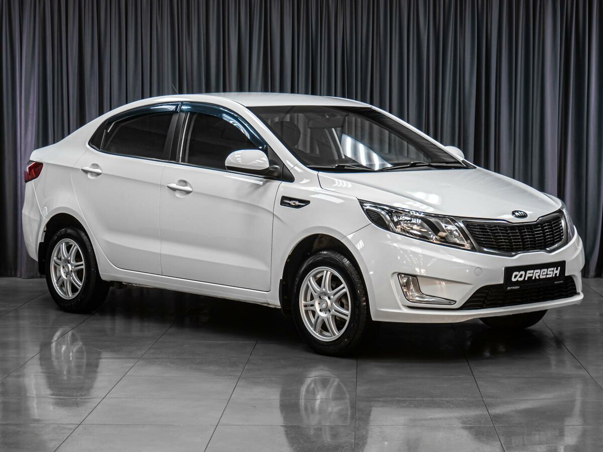 Открыть фотографии: Kia Rio III