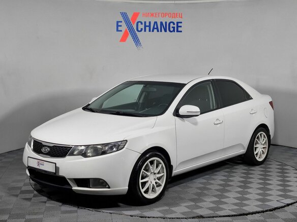 2011 Kia Cerato 5-speed II, белый, 555000 рублей