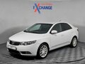 2011 Kia Cerato 5-speed II, белый, 555000 рублей