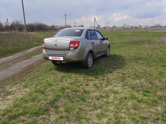 2012 Lada (ВАЗ) Granta I, серый, 420000 рублей - вид 4