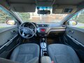 2012 Kia Rio 4-speed III, чёрный, 730000 рублей - вид 6