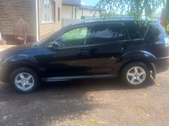 2010 Mitsubishi Outlander II Рестайлинг, чёрный, 1050000 рублей - вид 3
