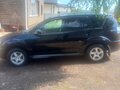 2010 Mitsubishi Outlander II Рестайлинг, чёрный, 1050000 рублей - вид 3