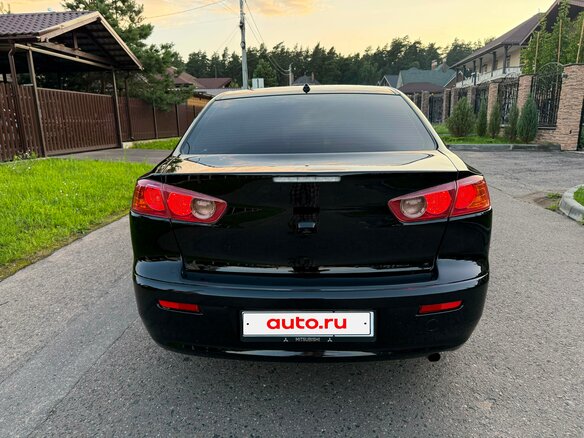 2012 Mitsubishi Lancer X Рестайлинг, чёрный, 669000 рублей - вид 5