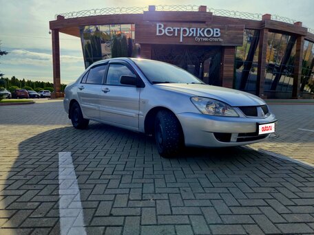 2006 Mitsubishi Lancer IX Рестайлинг, серебристый, 460000 рублей, вид 2