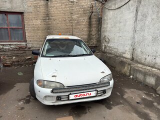 1991 Mitsubishi Mirage IV, белый, 550000 рублей, вид 1