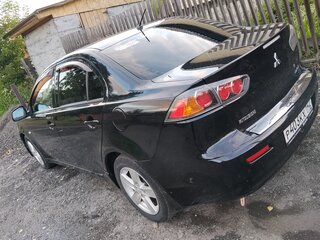 2013 Mitsubishi Lancer X Рестайлинг, чёрный, 780000 рублей, вид 3