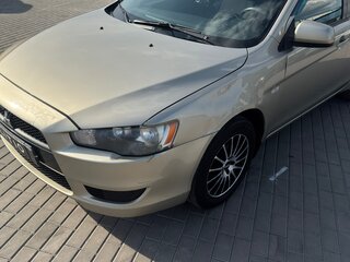 2008 Mitsubishi Lancer X, золотистый, 620000 рублей, вид 3