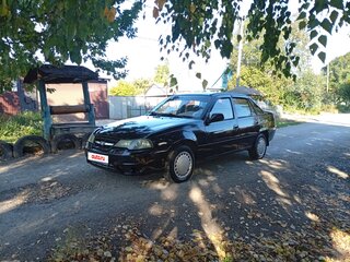 2012 Daewoo Nexia I Рестайлинг, чёрный, 128000 рублей, вид 2