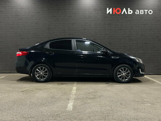 2011 Kia Rio 4-speed III, чёрный, 950000 рублей, вид 4