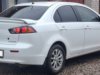 2012 Mitsubishi Lancer X Рестайлинг, белый, 615000 рублей, вид 4