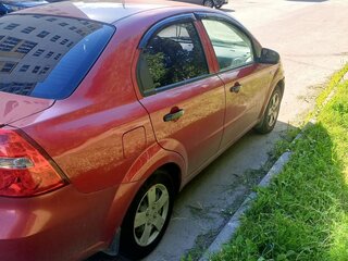2010 Chevrolet Aveo I Рестайлинг, красный, 370000 рублей, вид 2