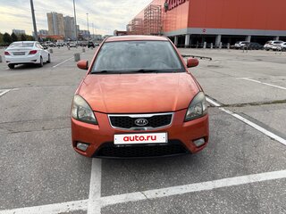 2010 Kia Rio II Рестайлинг, оранжевый, 600000 рублей, вид 4