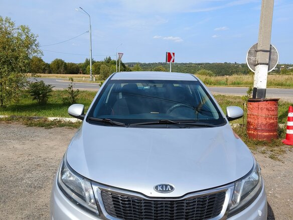 2011 Kia Rio 5-speed III, серебристый - вид 3