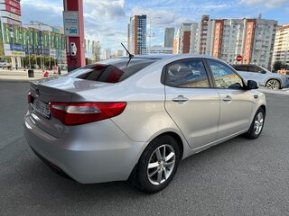2012 Kia Rio 5-speed III, серебристый, 777000 рублей, вид 4