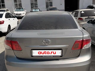 2011 Toyota Avensis III, серебристый, 850000 рублей, вид 4