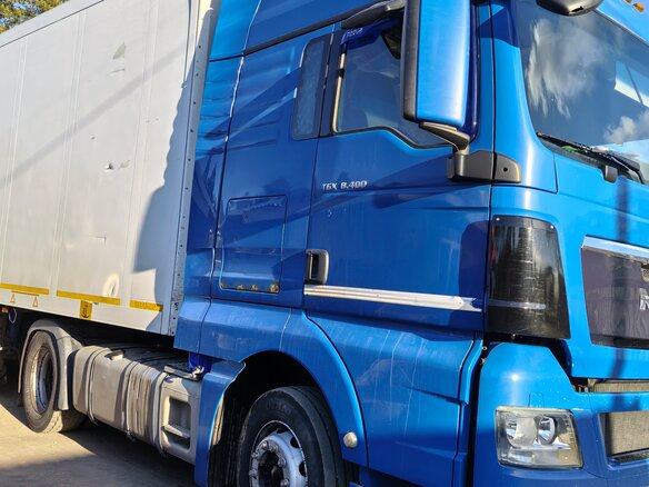 2009 MAN TGX, синий, 2600000 рублей - вид 1