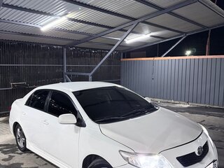 2009 Toyota Corolla X (E140, E150), белый, 780000 рублей, вид 4