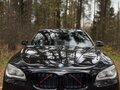 2009 BMW 7 серии 740d xDrive V (F01/F02/F04), чёрный, 1750000 рублей - вид 2
