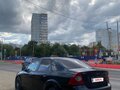 2009 Ford Focus II Рестайлинг, чёрный - вид 2
