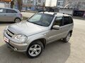 2014 Chevrolet Niva I Рестайлинг, серый, 610000 рублей - вид 1