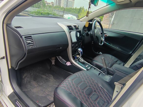 2007 Toyota Corolla Axio X (E140, E150), белый, 570000 рублей - вид 9